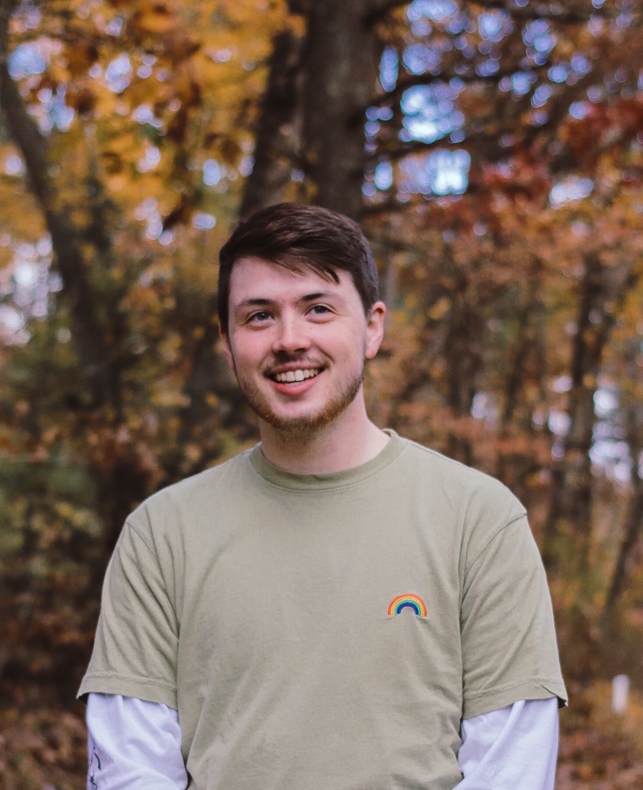 Shea with trees behind him